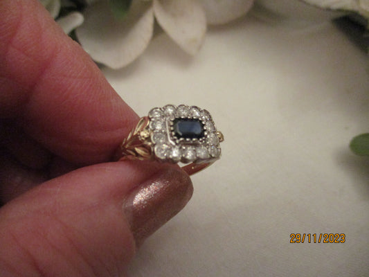 A Sapphire and Diamond Ring.